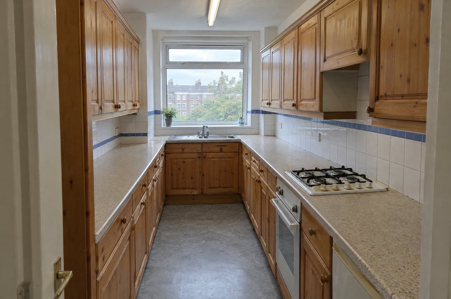 Before: the galley kitchen as it was, from the 1990s